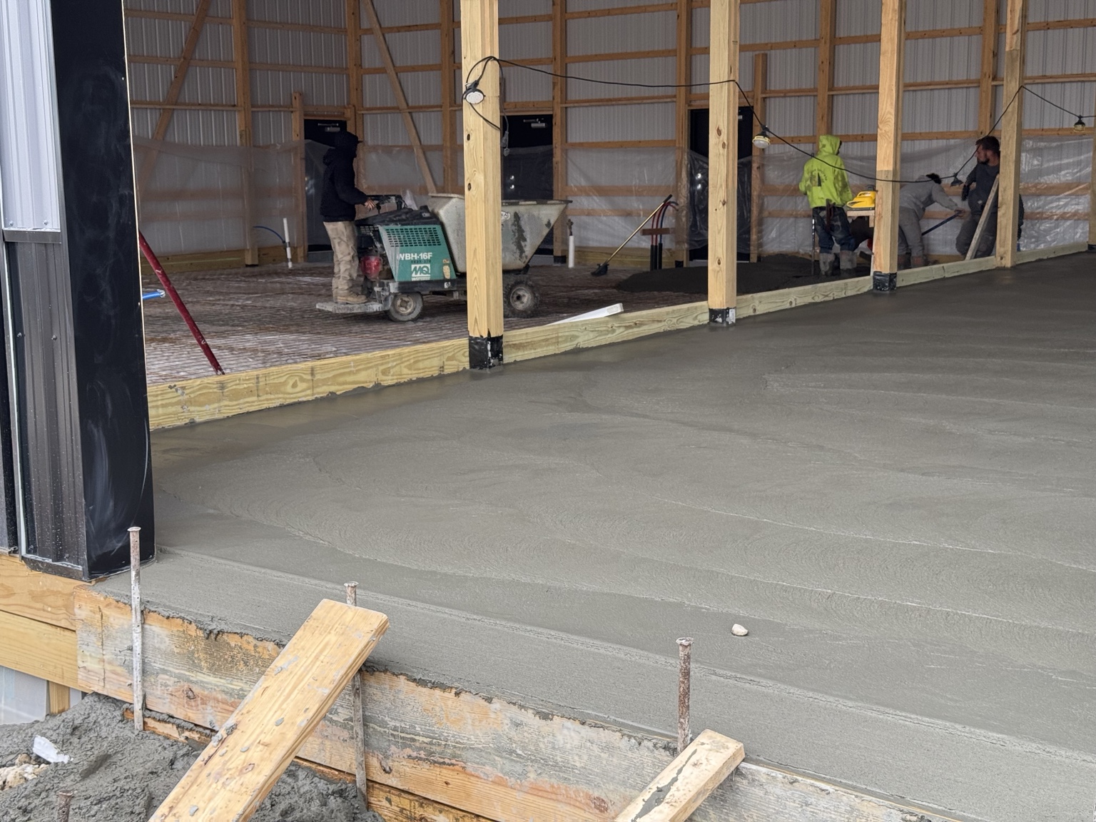Concrete floor being poured inside PROFLEX commercial flex space in Akron